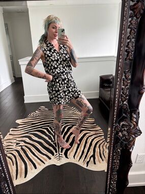 Daisy Print Black Sleeveless Romper